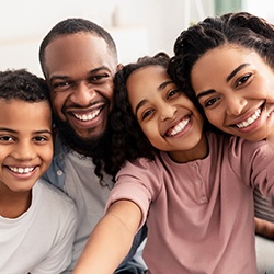 Family after seeing Ameritas dentist in Denton