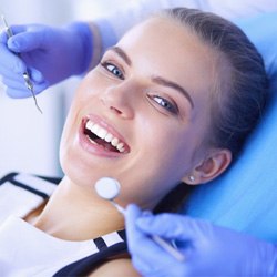 a patient visiting their Cigna dentist in Denton 