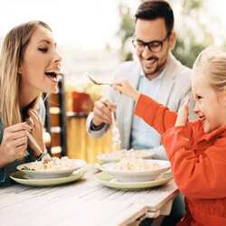 Family eating together at a restaurant