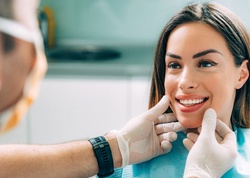 A young female patient who is receiving care by a dentist who takes Guardian in Denton