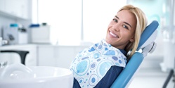 Woman smiling in dentist’s chair