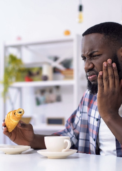 Man with a painful tooth
