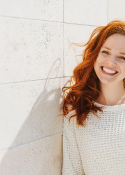 Woman smiling outside