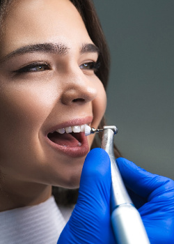 A woman getting a dental cleaning near Shady Shores