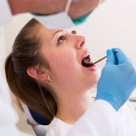 Woman having teeth worked on