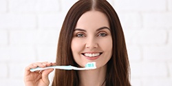 Woman brushing her teeth