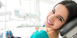 Smiling woman in dental chair