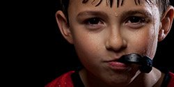 Young boy with black sportsguard