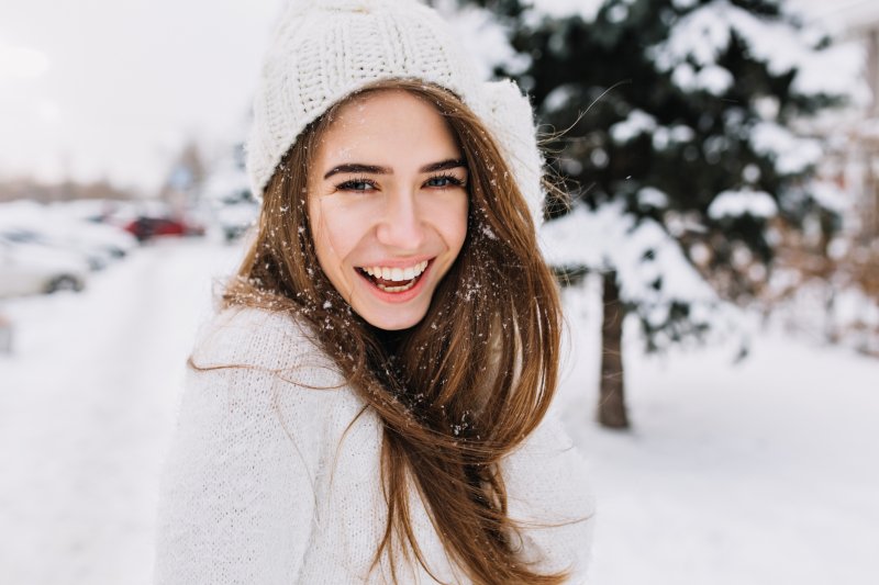 Woman smiling in the snow